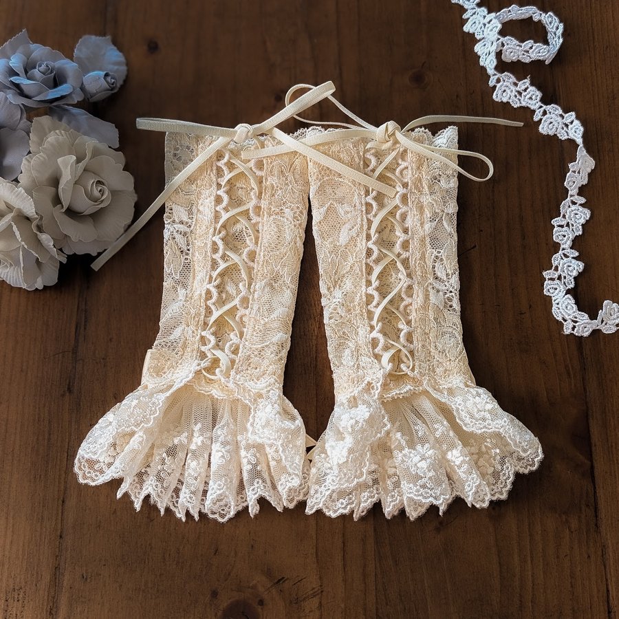 Aria Lace-up Armwarmers, showing the laced-up back